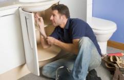 Plumber in Dale City Virginia repairs a bathroom sink